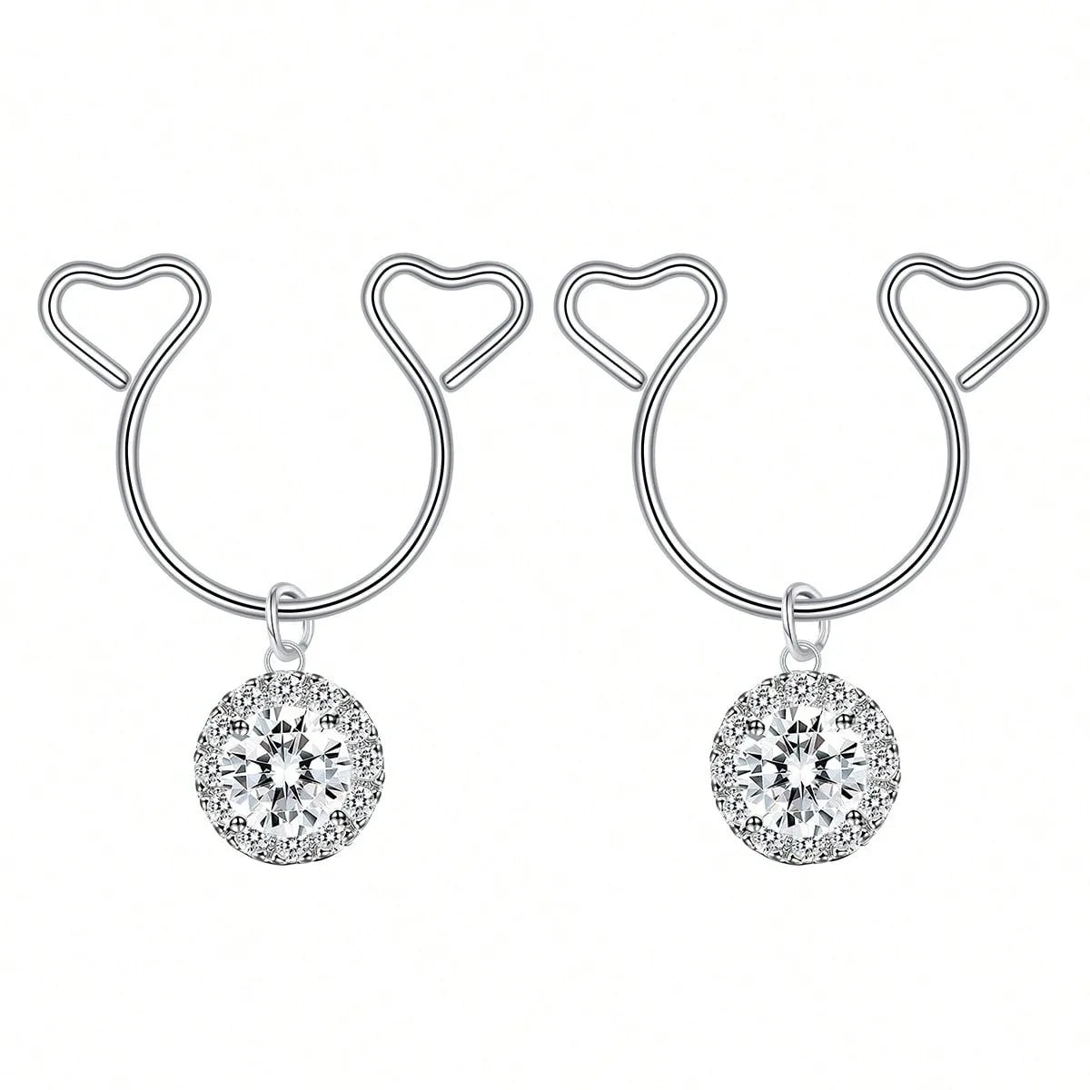 A pair of silver heart dangle non-piercing nipple rings adorned with cubic zirconia stones.