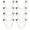 A set of multi-function magnetic clothing clips in silver metal.