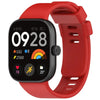 A red silicone watch strap is shown with a black smartwatch displaying health metrics and a rainbow weather icon.