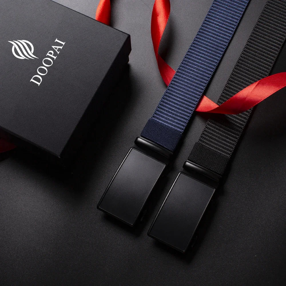 A black tactical canvas utility belt with a blue woven strap and red ribbon is displayed on a dark surface.