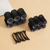A set of eighteen self-gripping hair rollers for curling, shown in black and gray on a light background.