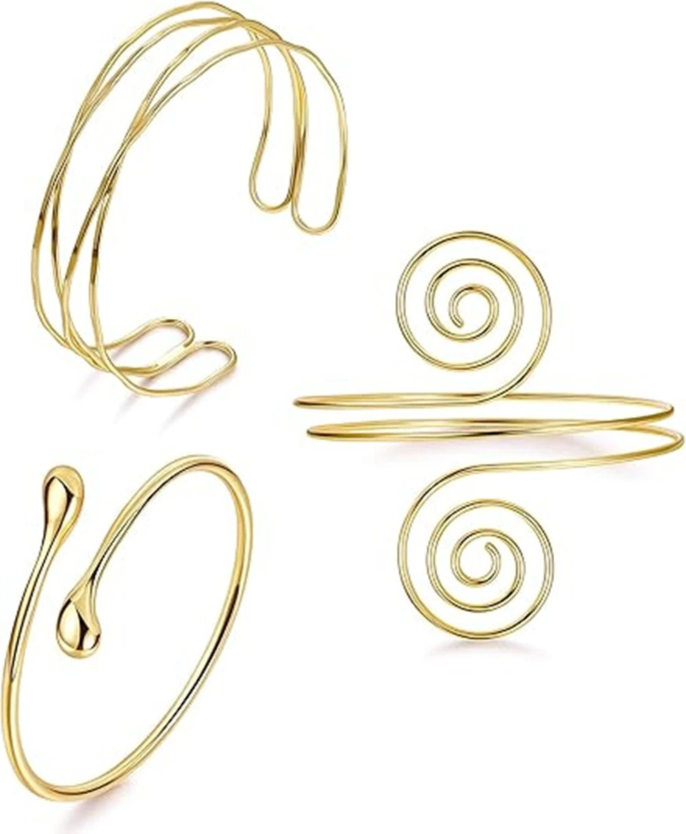 A set of six gold-plated swirl cuff armbands displayed against a white background.