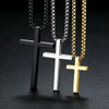 Three stainless steel cross pendant necklaces in black silver and gold metal finishes