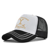 A white and black adjustable baseball cap with yellow embroidery featuring a letter Y and the text Dutton Ranch.