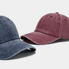 A close-up of a maroon washed cotton snapback cap shown in profile view.