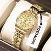 A gold-toned stainless steel quartz ladies wristwatch with a textured band is displayed in a light-colored box.