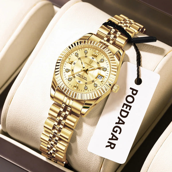 A gold-toned stainless steel quartz ladies wristwatch with a textured band is displayed in a light-colored box.