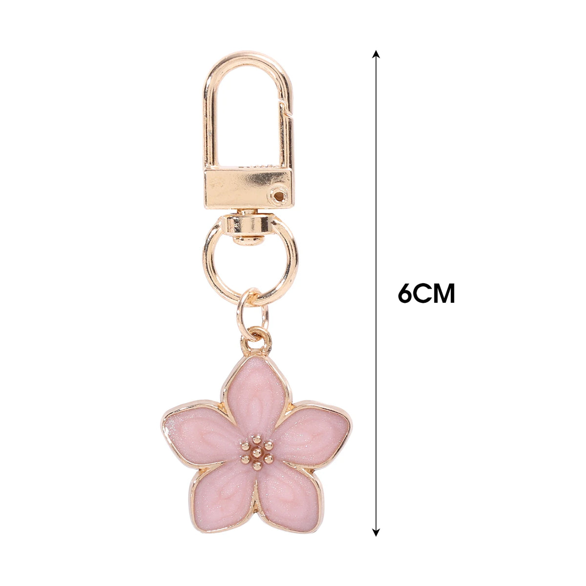 Llavero floral de tono dorado con gancho de candado y dije de flor rosa