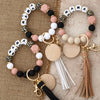 A set of leopard print silicone beads and gold keychains for women