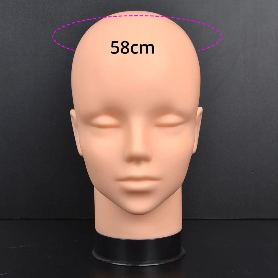 A realistic, light peach-colored mannequin head with a measurement line indicating 58cm.