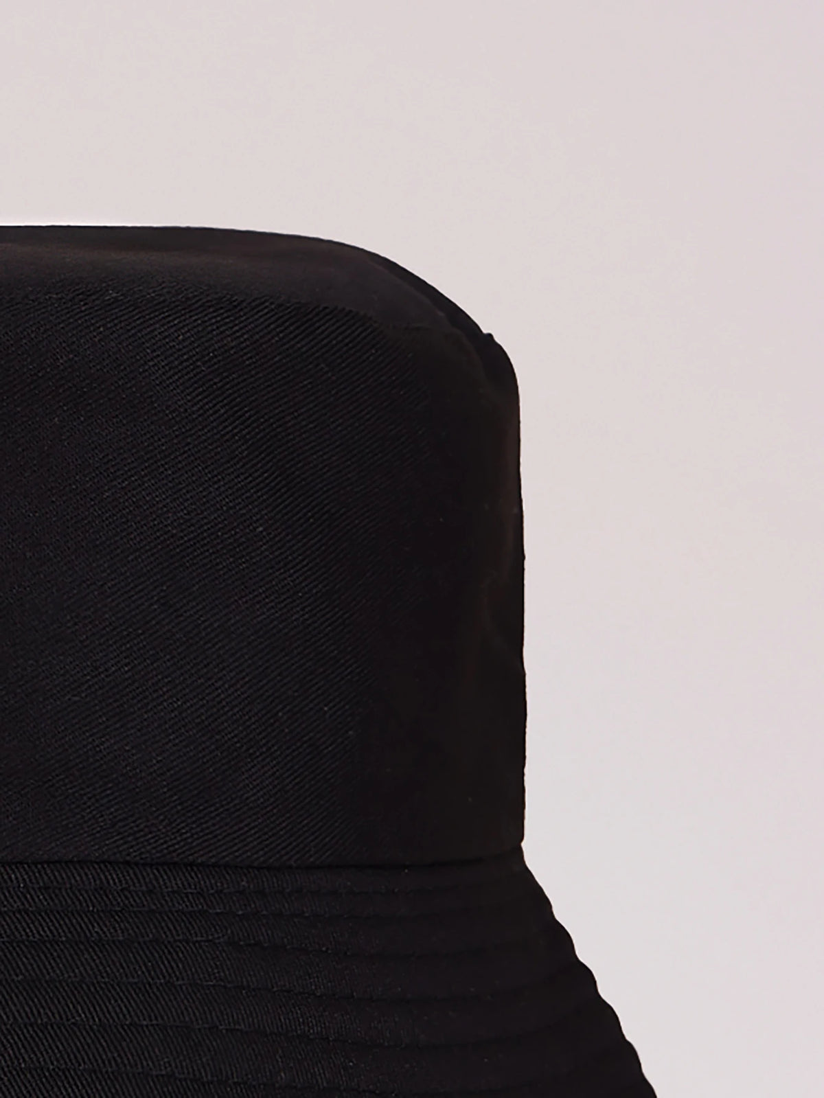 Black kids letter print sun hat shown in a close-up view against a light background.