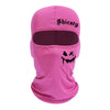 Máscara facial balaclava rosa brillante con el texto Shiesty y un gráfico de monstruo goteando.