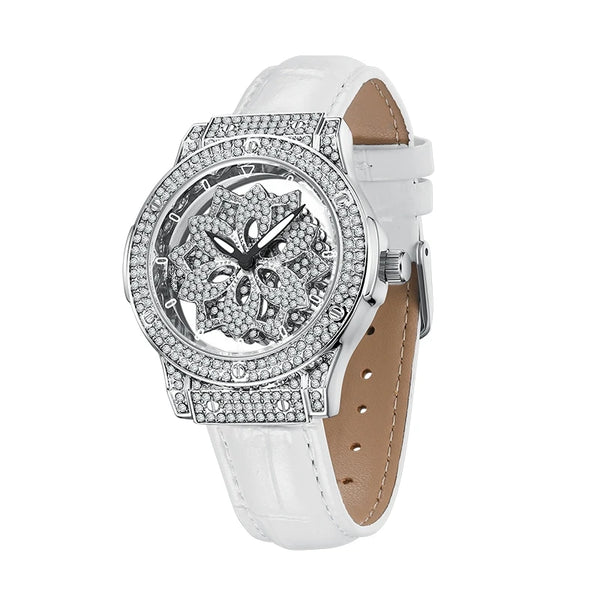 A white luxury quartz women's watch with a diamond-encrusted bezel and a tan leather strap.