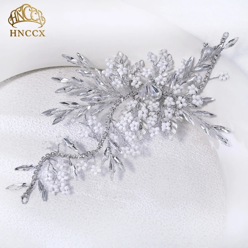 Silver rhinestone bridal headband tiara with delicate white floral and leaf accents
