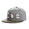 A gray unisex adjustable snapback cap featuring a stitched design of a lit cigarette.