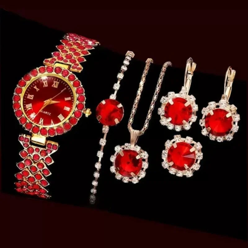 A set of elegant ladies quartz wristwatches featuring red stones and gold accents.