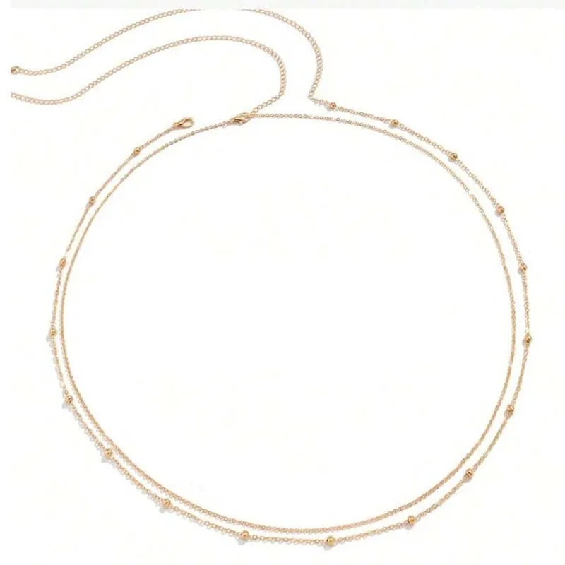 Gold layered metal belly chains for women featuring delicate chains and a circular design.
