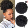 Black afro puff drawstring ponytail hair styled on a woman's head
