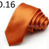 A folded orange satin neck tie displayed on a white background.