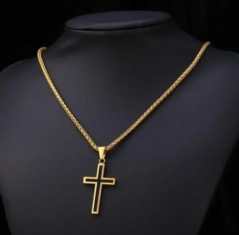 Gold retro Christian cross amulet necklace displayed on a black display stand.