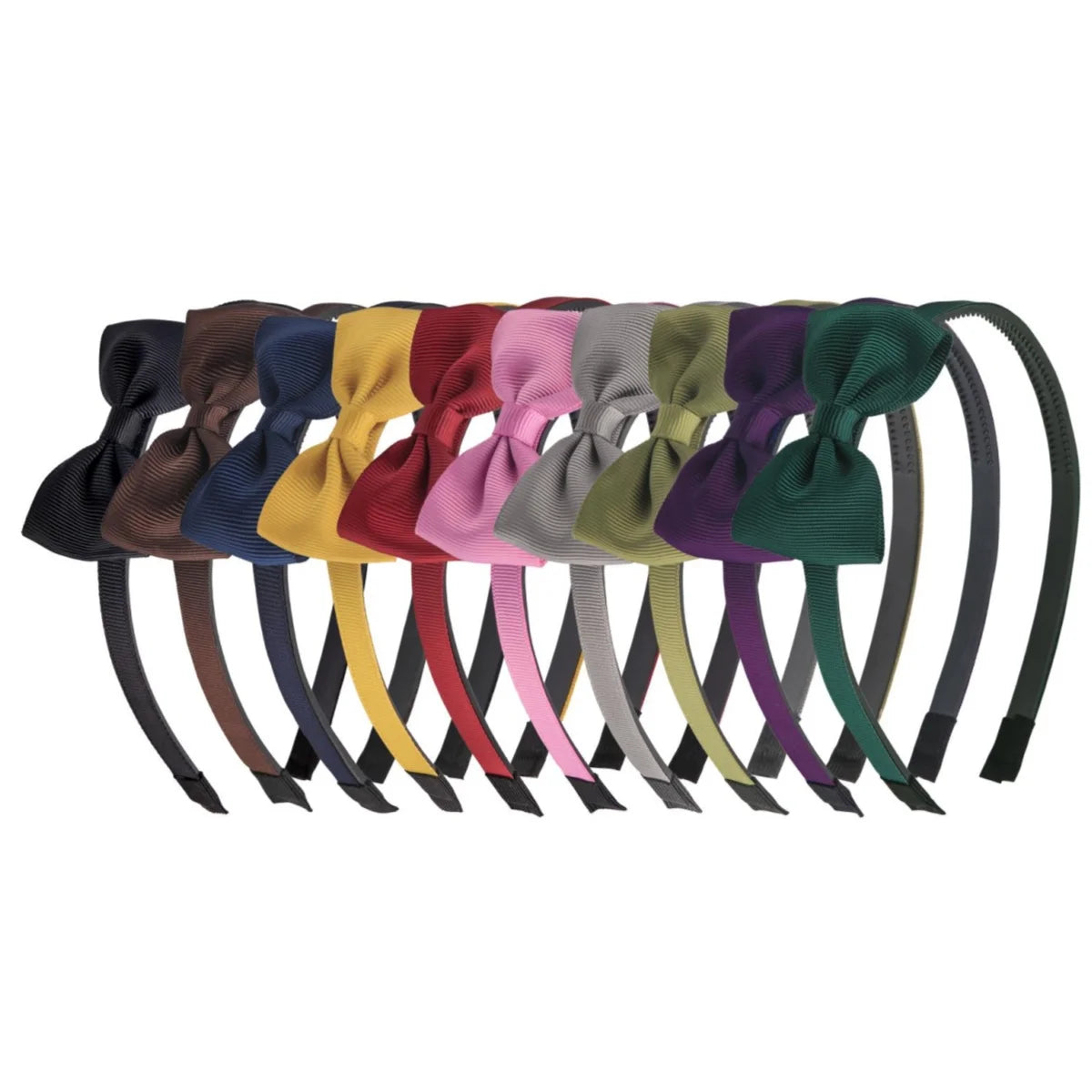 A collection of decorative grosgrain ribbon hair bows in various colors and shades.
