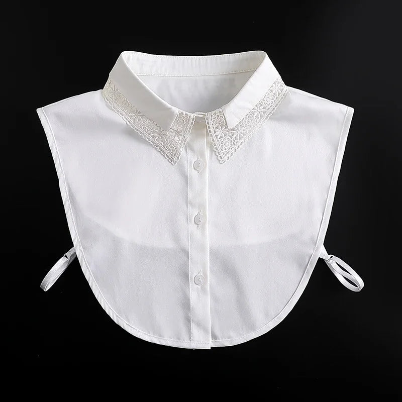 White blouse with a detachable lace false collar neckline and buttons