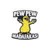 A black enamel lapel pin featuring a yellow cartoon chicken with an open beak and the text PEW PEW and MADAFAKAS!