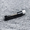 A black precision watch link pin remover tool is shown against a gray textured background.