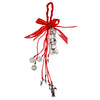 A red ribbon tied in a bow holds a wooden cross pendant for spiritual protection.