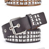 A close-up of three square bead rivet pyramid belts in brown, black, and white leather.