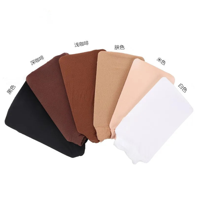 A collection of various colored stretchable mesh hair nets displayed on a white background.