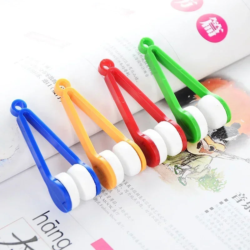 A set of colorful, portable multifunctional eyeglass cleaning tools with rubber tips and plastic handles.