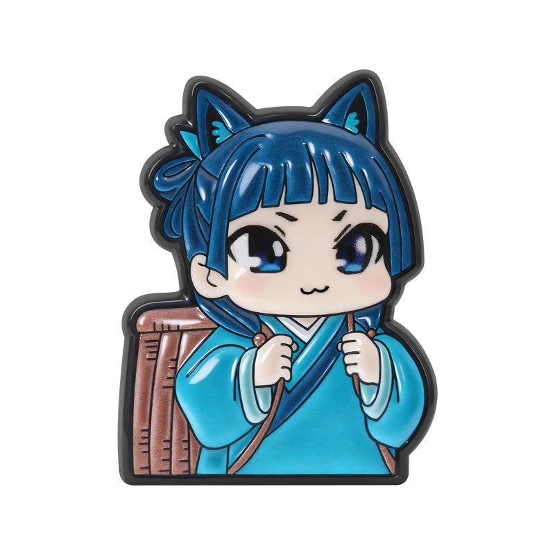 A cute anime character brooch featuring a blue-haired girl with large eyes and traditional clothing.