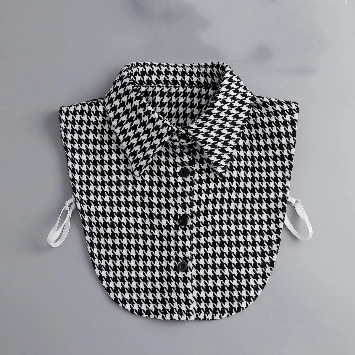Black and white houndstooth blouse with a false collar and detachable neckline