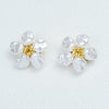Pair of white pearl button covers with gold accents for cufflinks