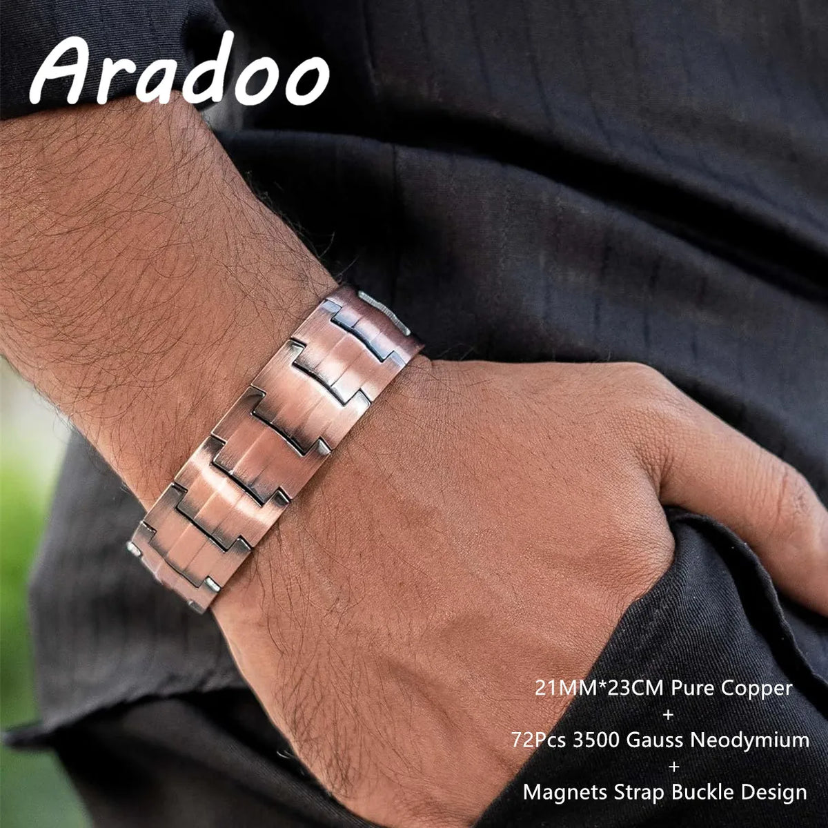 A close-up of a man's wrist wearing a copper magnetic bracelet with a strap buckle design.