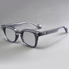 Lunettes de lecture anti-lumière bleue avec monture fine et légère unisexes en argent.
