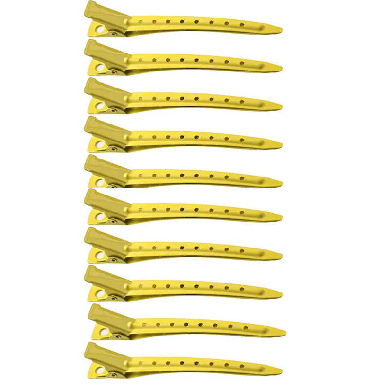 A set of professional fixed hair pins for styling in gold color