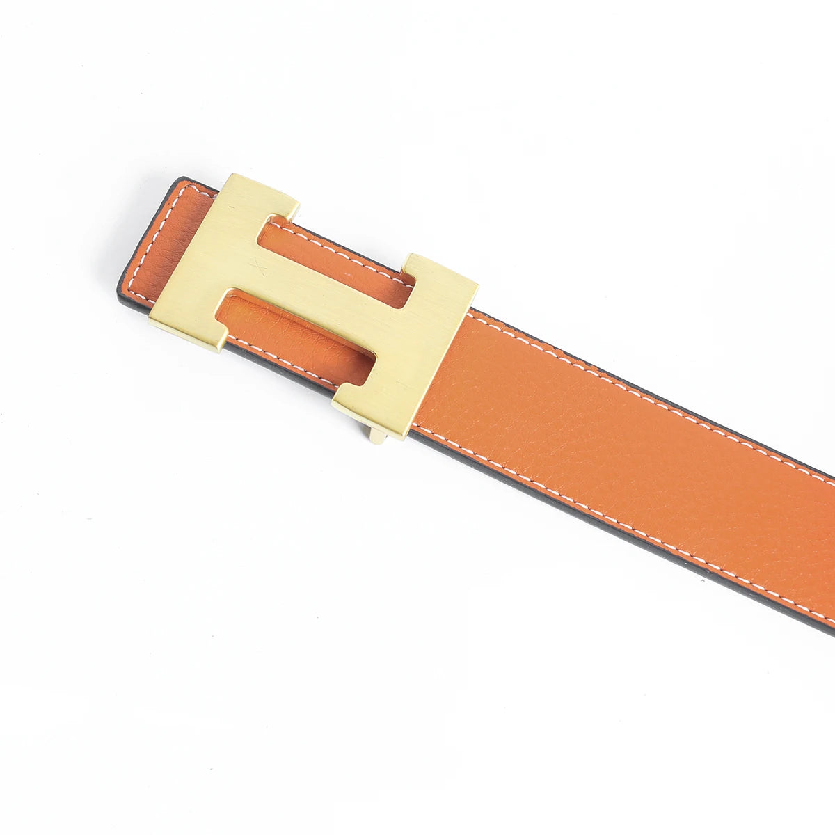 A genuine leather dress belt in orange-brown with a gold-toned buckle.