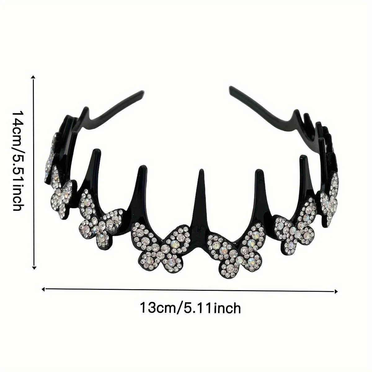 Black rhinestone butterfly hair clip with curved prongs and a measurement scale.