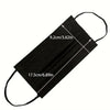 Black disposable face mask with ear loops shown diagonally.