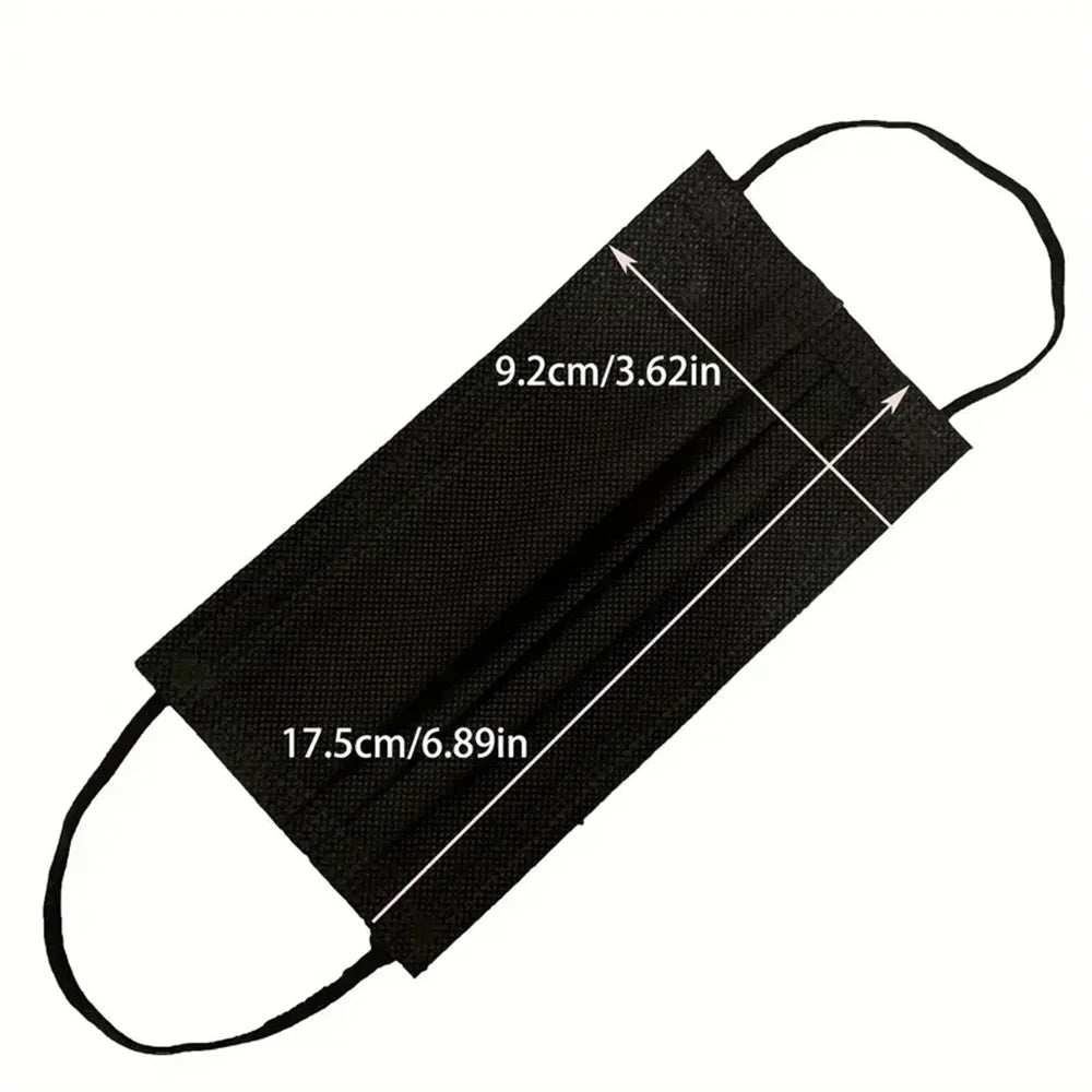 Black disposable face mask with ear loops shown diagonally.