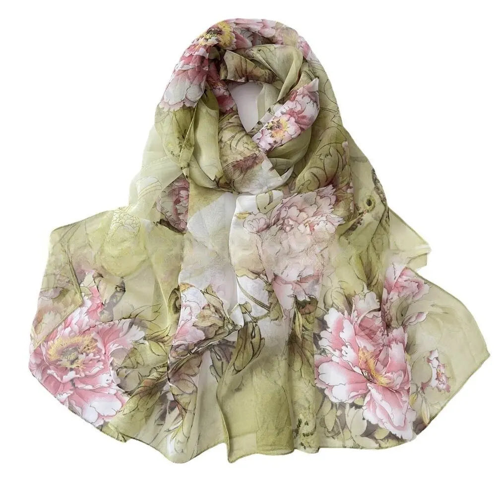 Étole en soie florale élégante dans des tons vert pâle et rose avec un motif floral délicat