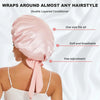 Pink satin wide-brimmed hair wrap headscarf being worn on a person's head