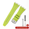 A bright lime green silicone watch band with a quick-release buckle and multiple holes for a sporty watch.