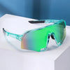 A pair of large frame trendy eyewear with vibrant green and blue gradient lenses resting on a white surface.