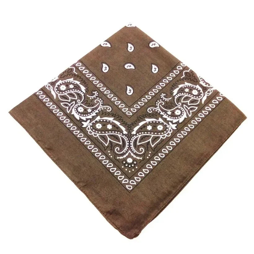 A square brown cotton bandana scarf with white paisley and geometric patterns.