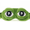 A green soft cotton sleep mask designed to relieve eye strain, featuring large, rounded eyes.