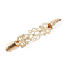 Gold vintage flower sweater clips with intricate filigree design