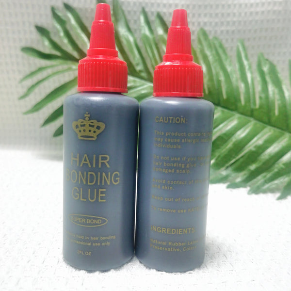 Two bottles of hair bonding glue with red caps and dark gray liquid set against a green leafy background.